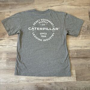 CAT Heavy Equipment Supply Co. grey and white t-shirt men’s L measures 21x28